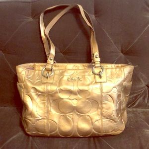 Gold COACH purse